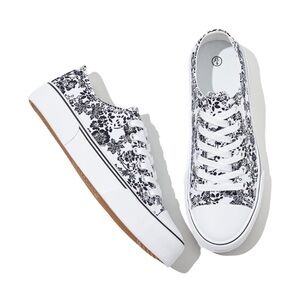 NWT. Size 5.5.  Adokoo pale beige with black flowers canvas low-top sneakers